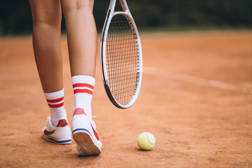 young-female-tennis-player-court-feet-close-up.jpg