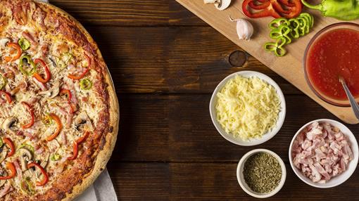 top-view-pizza-with-pepper-ingredients.jpg